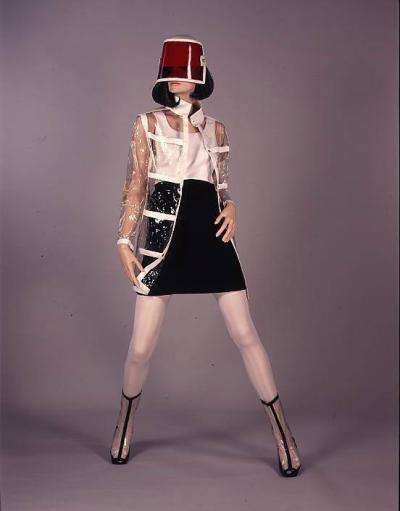 1966 Michele Roisier: Clear PVC mac, visor hat by Simone Mirman, boots by Elliott. Selector: Ernestine Carter, The Sunday Times