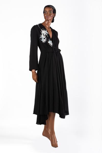 2021: Giorgio Armani: Black triple silk georgette dress with deep front, lotus flower embroidery. As worn by Meghan, Duchess of Sussex. Selectors: Ibrahim Kamara and Gareth Wrighton