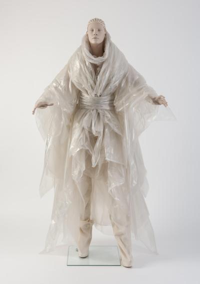 2014 Gareth Pugh: Plastic coat and wrap ensemble, worn with tied kimono-style belt and calico trousers. Selector: Katie Grand