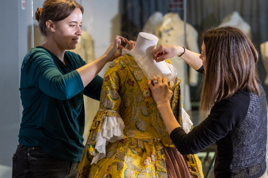 The collections team put a dress on a mannequin